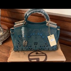 Segolene Paris laser-cut handbag